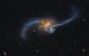 75097_Slivayushayasya_galaktika_NGC_2623.