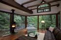 7623_cool-glass-house-forest-window-fireplace.