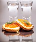 76427_depositphotos_55427475-Vodka-and-Sandwiches-with-red-caviar.